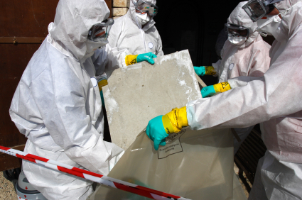 staff removing some asbestos 